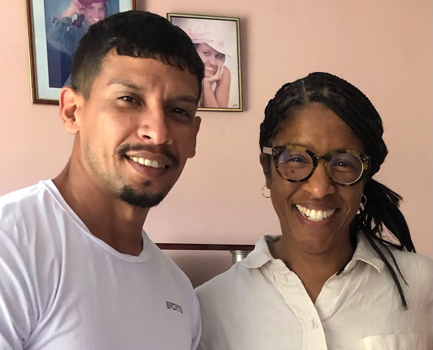 Dr. Renee Quarterman smiling beside a Cuban colleague.